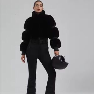 $400. GSOU 2026 style one piece ski suit. Black top of the line. Mint condition!